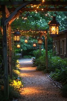 an outdoor walkway with lights strung over it and trees in the backgroung