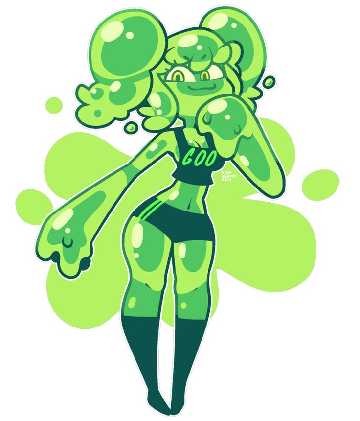 a woman in green and black is holding bubbles