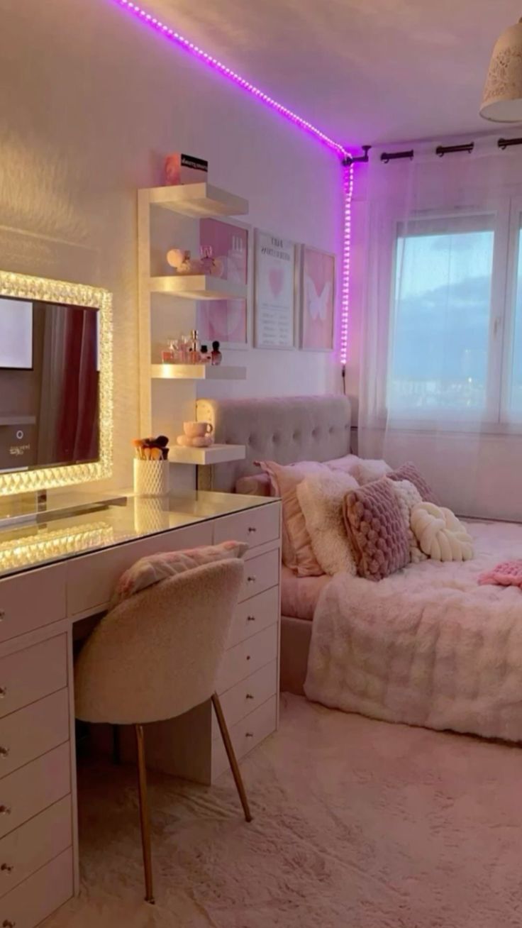 a bedroom with a bed, desk and mirror