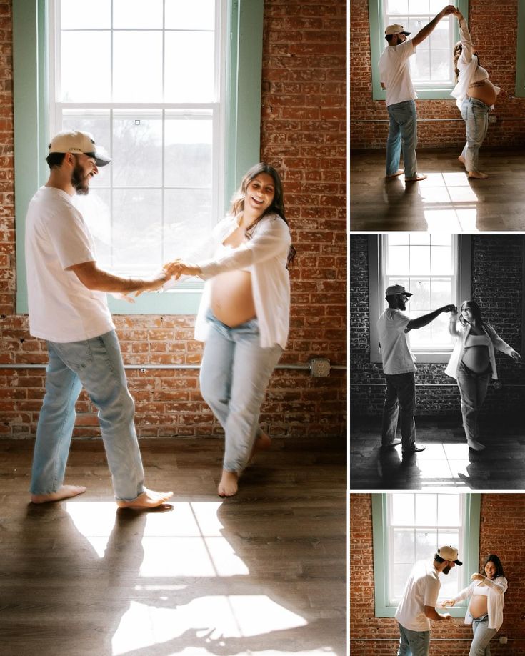 a man and woman dancing together in front of a window with their arms around each other