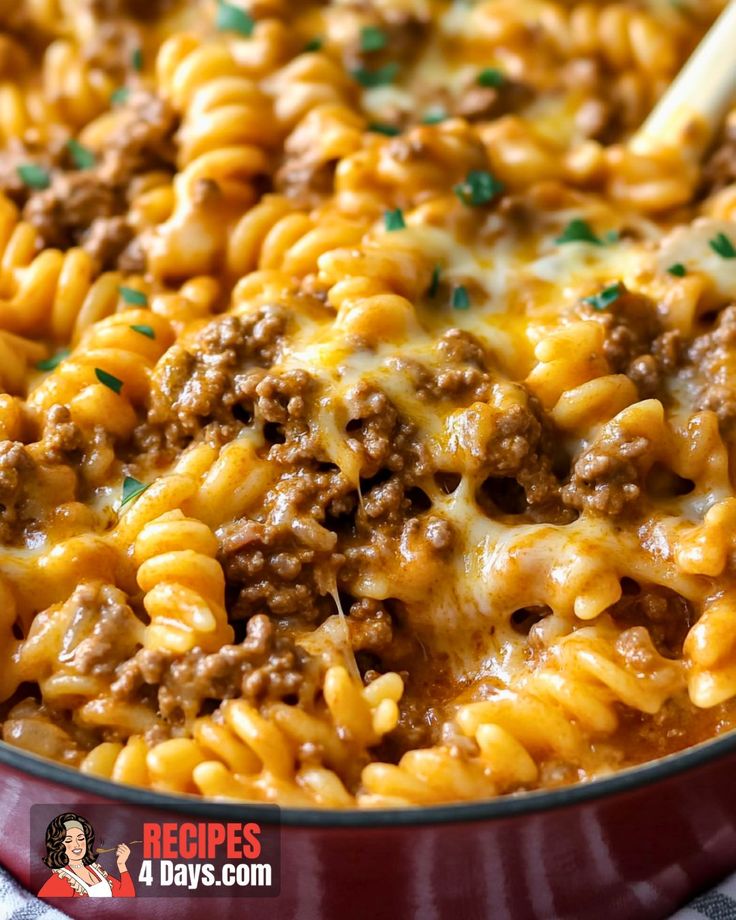 a casserole dish filled with ground beef and cheese