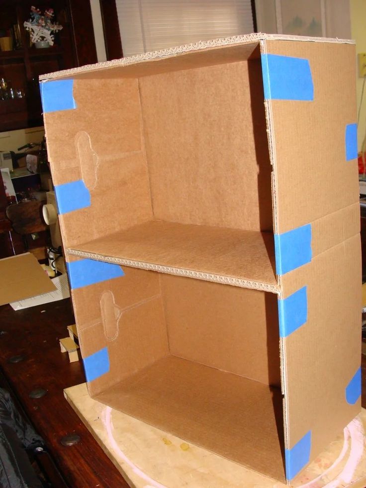 cardboard boxes are stacked on top of each other