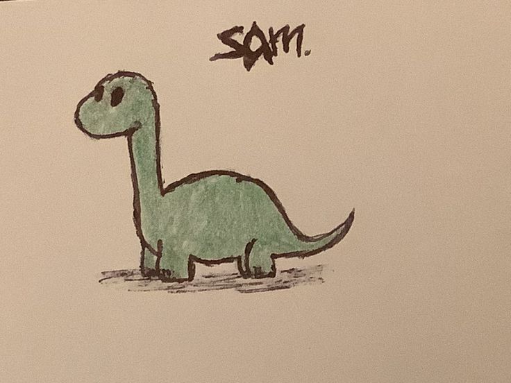 a child's drawing of a green dinosaur with the word son written on it