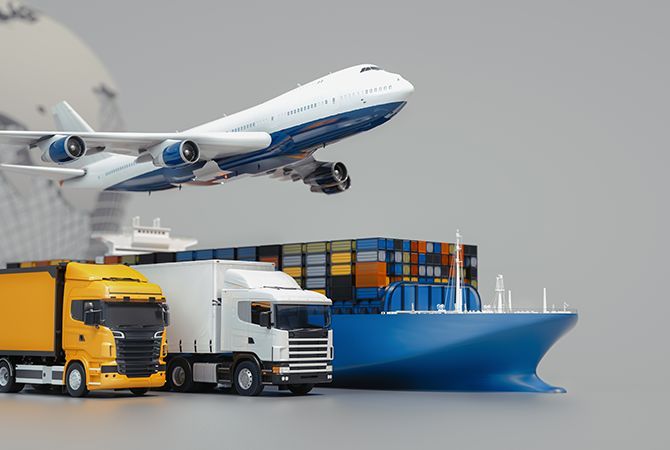 an airplane is flying over a truck and a cargo ship