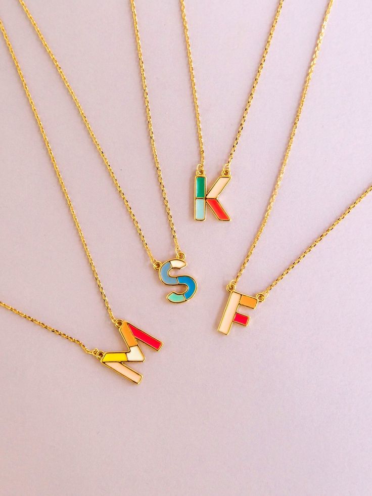 Initial jewelry but make it colorful, the Oliva Luxe Initial Necklace is perfectly on trend. 18K gold plated initial charm necklace with enamel inlay .5" charm 16" with 3" extender Hypoallergenic Nickel and lead free Alphabet Necklace, Back To School Essentials, Fits Clothes, Mama Style, Enamel Necklaces, Initial Jewelry, Enamel Charms, Initial Charm, Jewelry Inspo