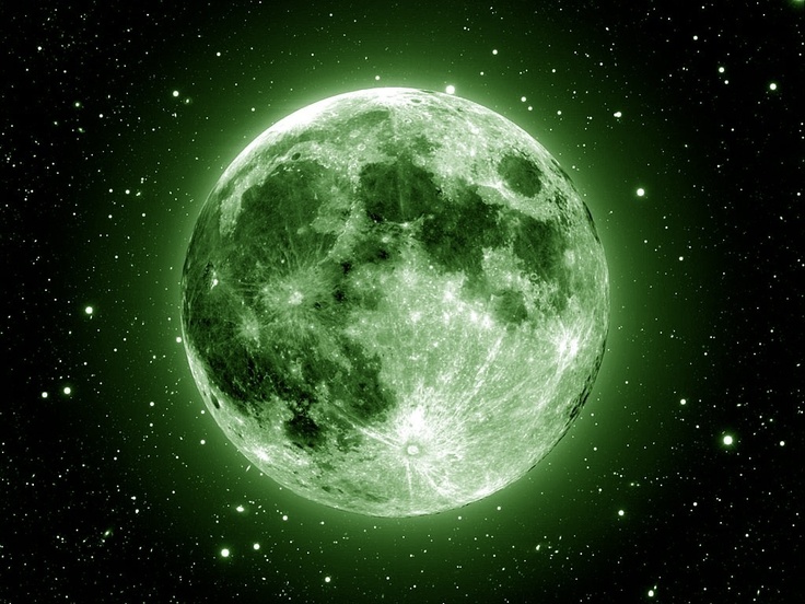 an image of the moon taken from space with stars in the background and green hues