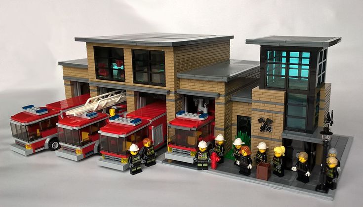 a lego fire station is shown with the lights on