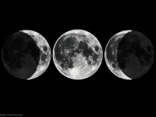 three phases of the moon in black and white