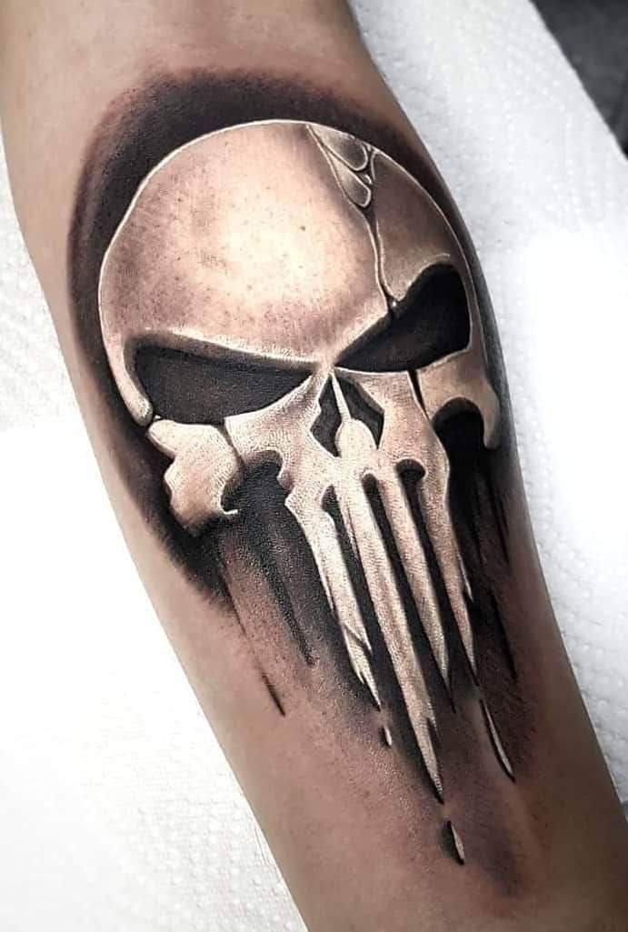 a black and white tattoo with a skull on it