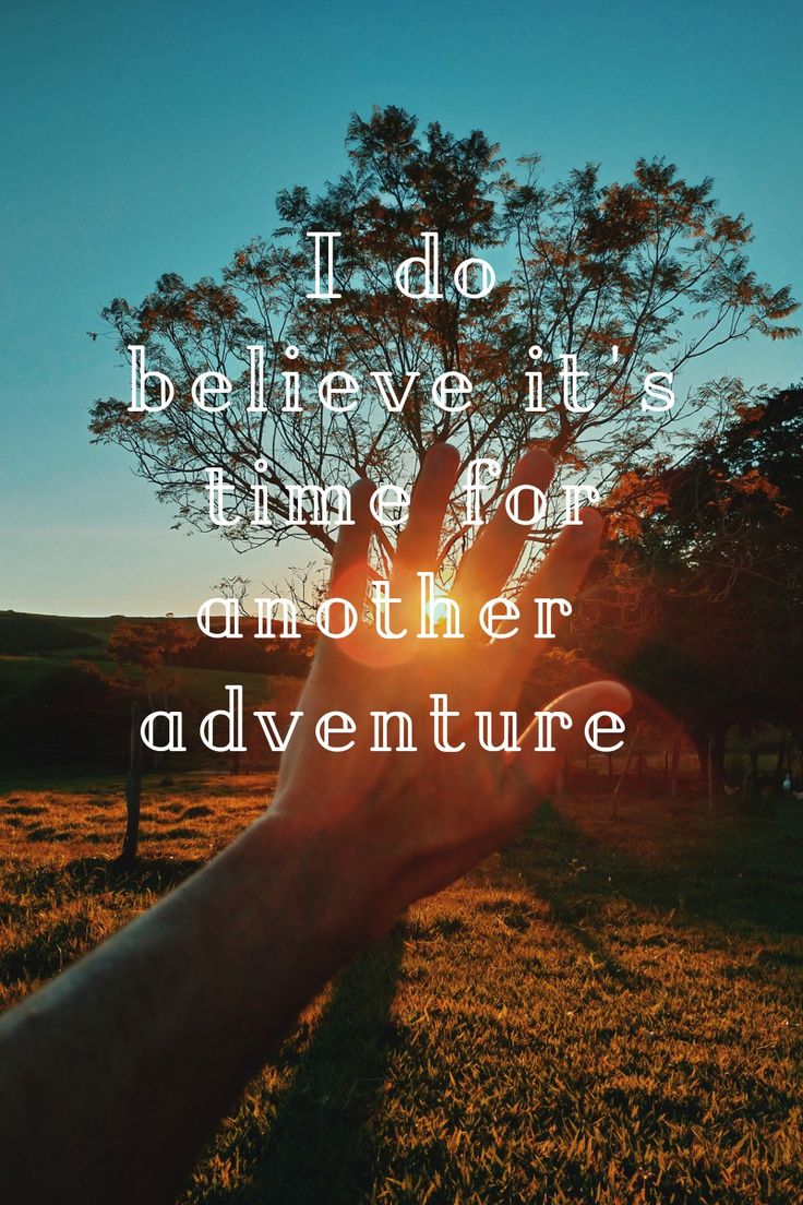 someone holding their hand up in the air with an inspirational quote above it that reads, i do believe it's time for another adventure