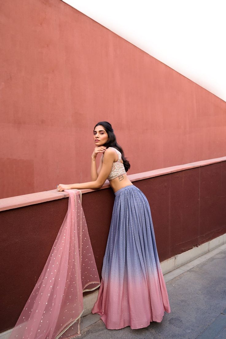 Grey to Mauve Pink Ombre Lehenga paired with mauve pink glass beads glamourous embroidered blouse and tulle dupatta.From Chamee and Palak's Anam Cara collection. DELIVERY TIMEPlease allow 8-12 weeks for your outfit to arrive. FABRIC DETAILSGeorgette, Raw Silk, and Net Steam Iron & Dry Clean. Dusty Pink Outfits, Ombre Lehenga, Gold Work Embroidery, Sea Green Color, Ethnic Dress, Organza Dupatta, Gold Work, Steam Iron, Mauve Pink