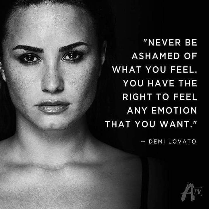 a black and white photo of a woman's face with a quote from demi lovato