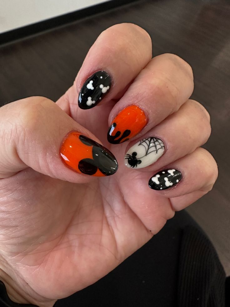 Disney Halloween Nail Stickers, Disney World Nails Halloween, Mickeys Not So Scary Halloween Nails, Mickey Mouse Inspired Nails, Simple Halloween Disney Nails, Disney Pumpkin Nails, Minnie Halloween Nails, Short Disney Halloween Nails, Minnie Mouse Halloween Nails