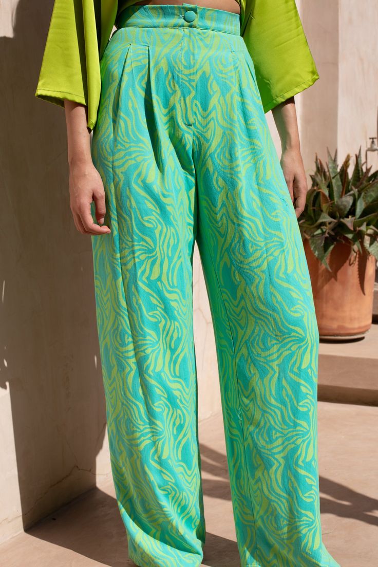 Funky pants with trippy print in contrasting colours. The fabric has a very soft feel and falls beautifully. Flattering cuts give any body shape a beautiful laid-back silhouette. Perfect pop of print pants, to add a dose of colour to your wardrobe. Beautiful with a pair of sneakers for a city look, and goes also with wedges for a night dance. SIZING DETAILS: Model is 5ft65" (169cm) and she's wearing a 36 Funky Pants, Belle Silhouette, Contrasting Colours, Jackets Uk, Dose Of Colors, Neon Purple, Print Pants, Dresses Uk, Printed Pants