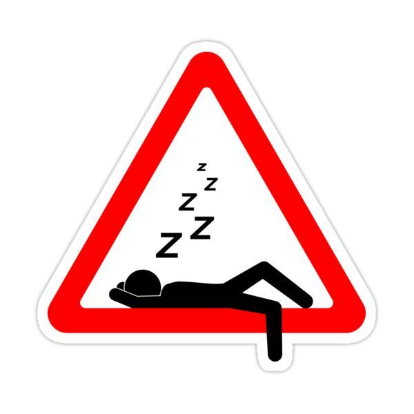 a red triangle sign with a person sleeping on it