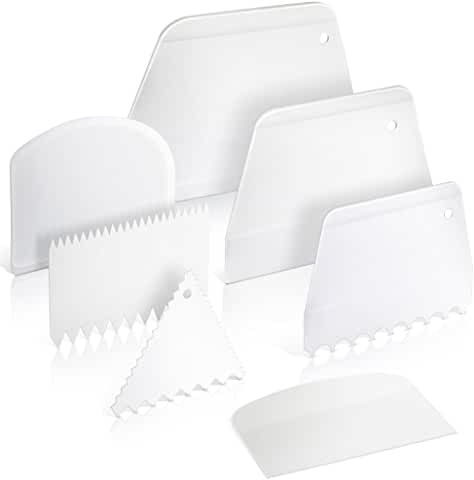 white plastic cutting boards and dividers on a white surface