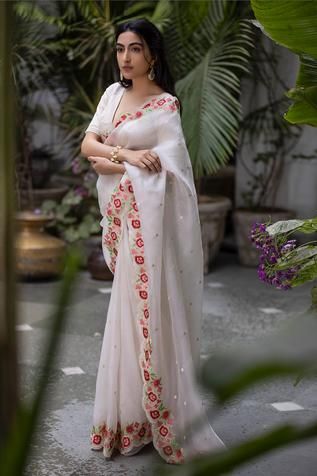 Off white saree with all-over delicate embroidery and contrast yellow scallop edged border. Comes with chanderi blouse.
Component: 2
Embroidered
Neckline: V-Neck
Sleeve Length: Half
Fabric: Saree: Silk Organza; Blouse: Handwoven Chanderi 
Color: White
Embroidered blouse
Tie-up at the back with latkans
Hook closure at the front
Scallop edged border - Aza Fashions Indian Bridesmaid Outfits, Organza Saree With Blouse, Off White Saree, White Embroidered Blouse, Embellished Crop Top, Bridesmaid Saree, Organza Blouse, Simple Sarees, Saree Silk