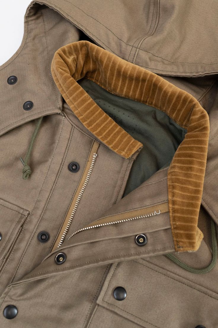 Warehouse & Co. - The Landing Coat - Khaki This hooded jacket, crafted with military jungle cloth and incorporating trims and parts from military uniforms and equipment, appears to have been issued by either the US Army or Navy. Unfortunately, the specification label has faded due to washing, and John couldn't find any other label to determine its origin. Nevertheless, the attention to detail on this piece is remarkable. We are simply blown away when we pulled this classic out of the box. Notewo Bandana Blanket, Rogue Territory, Chief Petty Officer, Iron Heart, Military Uniforms, Vintage Fits, Tee Shirt Print, Cargo Pant, Military Uniform