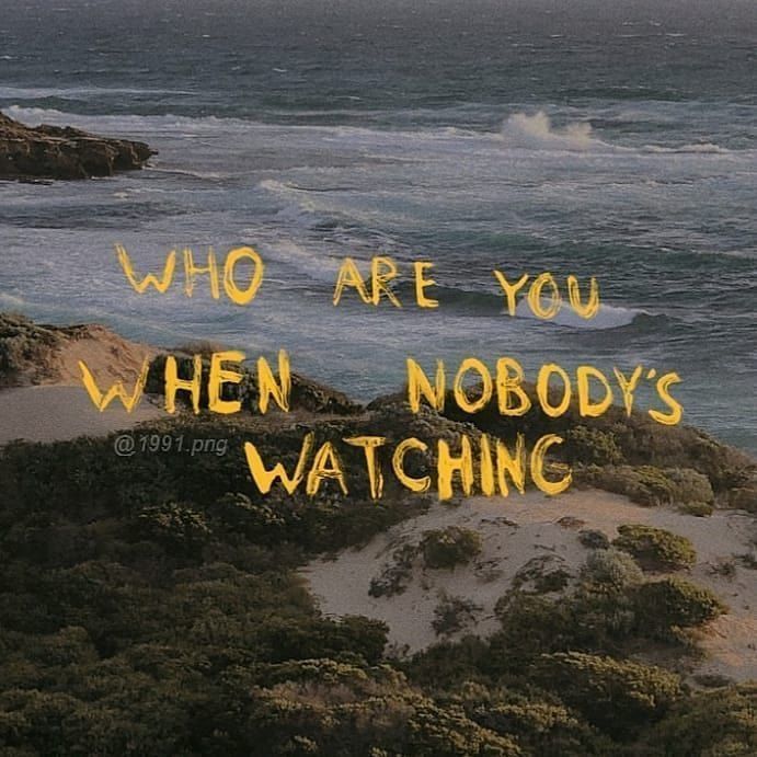 the words who are you when nobody's watching written in yellow ink on an ocean background