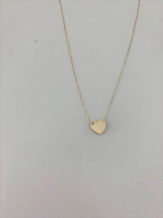 14k Solid Gold Heart Necklace, Bold Heart 14k Gold, Hollow Heart, Bold Hollow Gold Heart, Dainty Necklace, Layering Necklace, Gold Heart Necklace ------------------------------------------------------------------------------------------------ The Heart Necklace is a beautiful, affordable dainty 14K Solid Gold piece of jewelry that is great for everyday wear. It comes available just in yellow gold. This necklace can be used in combination any of our other necklaces for a layering effect. A great 14k Gold Heart Cut Necklace With Adjustable Chain, 14k Gold Heart Pendant Necklace With Adjustable Chain, 14k Gold Heart Charm Necklaces With Adjustable Chain, 14k Gold Heart Charm Necklace With Adjustable Chain, 14k Gold Necklace With Heart Charm And Cut, 14k Gold Heart Necklace With Adjustable Chain, 14k Rose Gold Heart Pendant Necklace, Rose Gold 14k Heart Pendant Necklace, 14k Gold Heart Necklace With Heart Charm