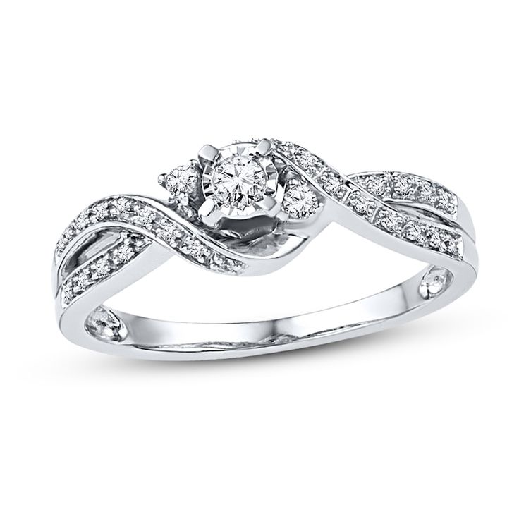 a white gold ring with diamonds on it