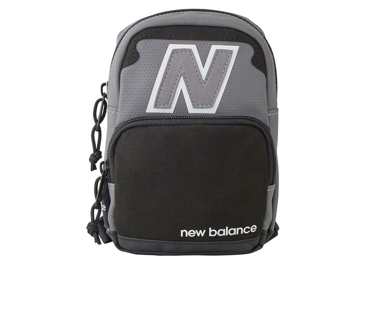 The Legacy micro backpack is designed with details linking back to the heritage of New Balance Footwear icons, and provides an stylish way to carry your key items with You. The bag features 2 zipped compartments, and has a protected base for durablitity and protection. The adjustable shoulder straps allows for individual fit and carry style. Embossed PU (100%),Zipper closure,7.1\ Height,16.9\ Width,2.2\ Depth,19-33\ Strap length, Large main compartment, Front zippered compartment, Protective bas Black Friday Specials, Backpack Reviews, Luggage Backpack, Backpack Sport, Waist Pack, Grey Women, Fun Bags, 16 9, Hobo Bag