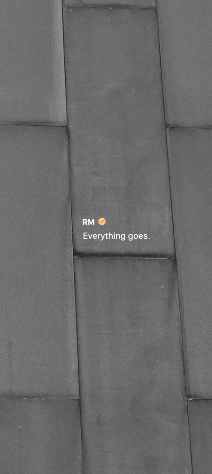 a black and white photo with the words rm everything goes on it's side