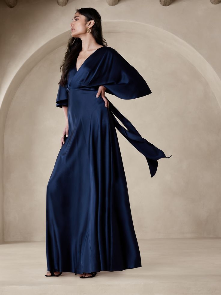 Crafted from customer favorite silk charmeuse, this stunning maxi dress employs a plunging tie back and a bias cut to enhance its drape.  Sheath fit.  V-neck.  V-back.  Invisible zip at wearer's left.  Batwing sleeves.  Unlined.  Sheath fit.  Sleeveless.  Maxi length.  Model: Size 2, 5'10" (178cm). Theme Dress, Silk Maxi, Silk Maxi Dress, Silk Charmeuse, Invisible Zip, Banana Republic Dress, Perfect Woman, Cocktail Dress Party, Tie Back