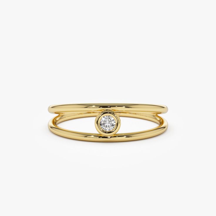 a gold ring with a diamond on it