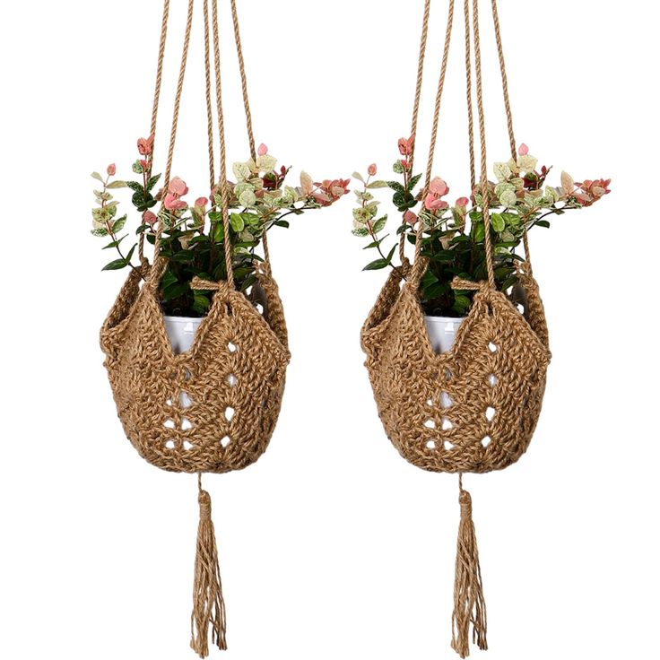 two hanging planters with flowers in them