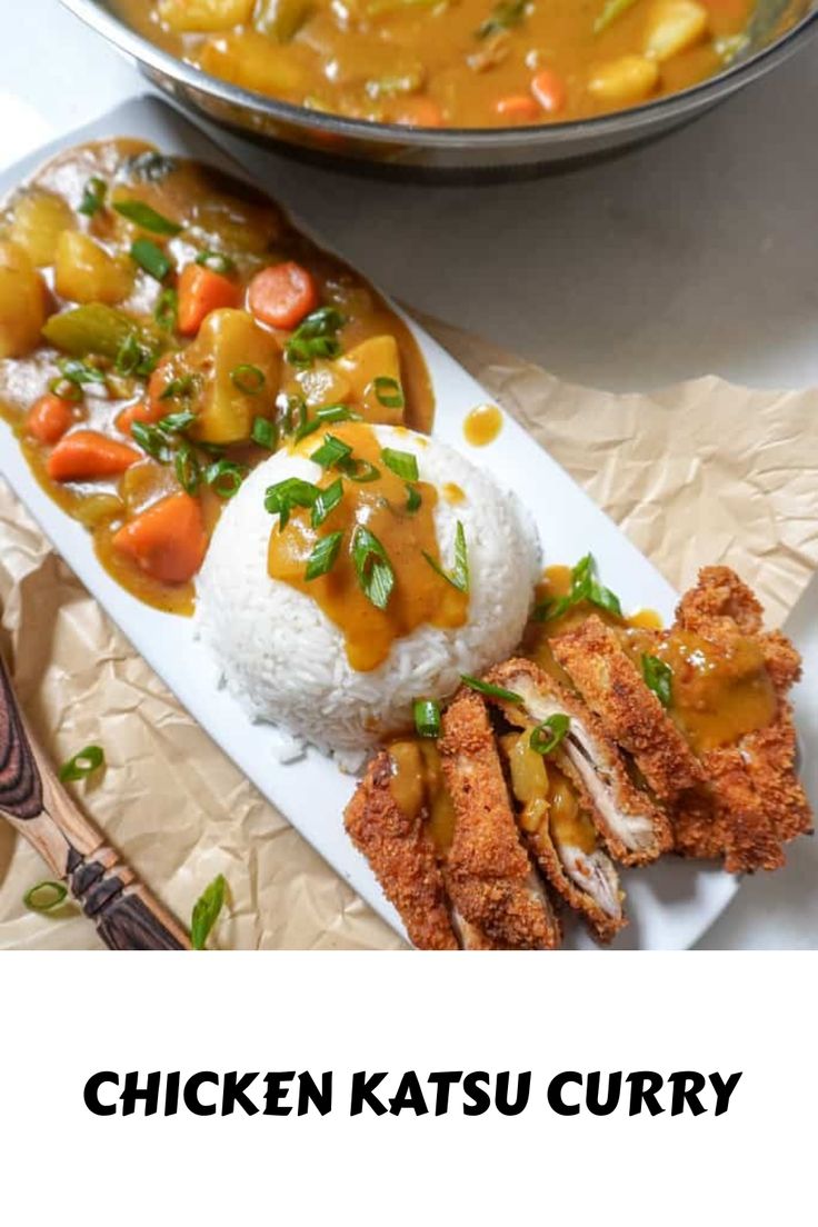 chicken katsu curry with rice and vegetables on a white plate next to a silver pan