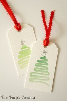 two tags with christmas trees on them