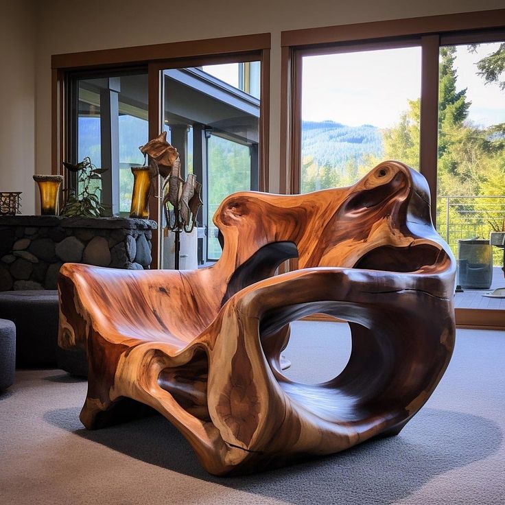 a wooden chair sitting on top of a carpeted floor in front of a window