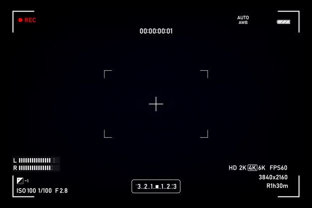 an image of a black screen with white numbers and red dots on the bottom right corner