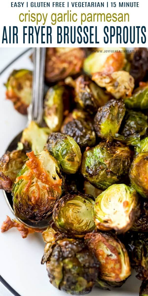 a plate with brussel sprouts on it and the words crispy garlic parmesan air fryer brussel sprouts