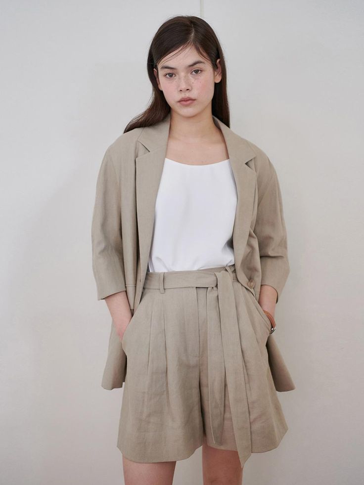 This is a casual and refined jacket that is made out of high quality cotton, linen, and rayon blend fabric. With design detail of relaxed silhouette with dropped shoulderline and light weight without lining, it gives a trendy and refined look. - Button opening on the cuffs- Herringbone tape inside- Light weight without lining- Dropped shoulder and relaxed silhouette Neutral Linen Blazer For Work, Oversized Beige Cotton Blazer, Summer Neutral Blazer For Workwear, Beige Relaxed Fit Blazer For Work, Chic Neutral Summer Blazer, Cream Linen Outerwear For Work, Summer Linen Blazer In Neutral Color, Modern Linen Outerwear For Summer, Modern Linen Summer Outerwear