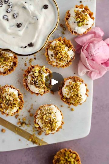 mini desserts with whipped cream and sprinkles on a plate