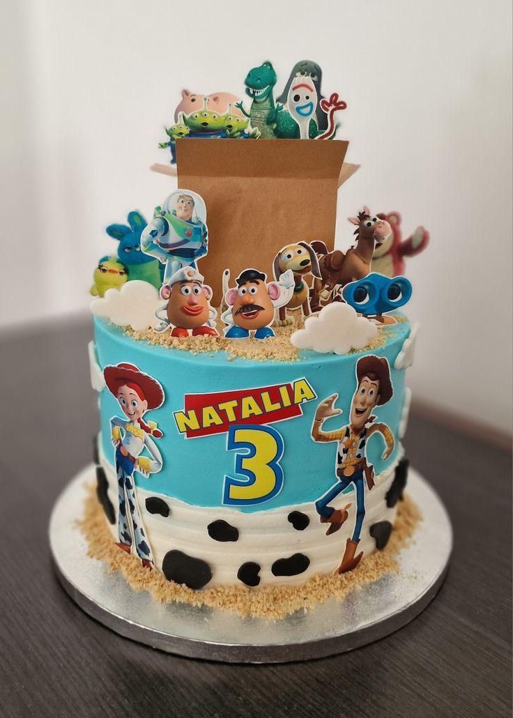 a birthday cake with toy story characters on it