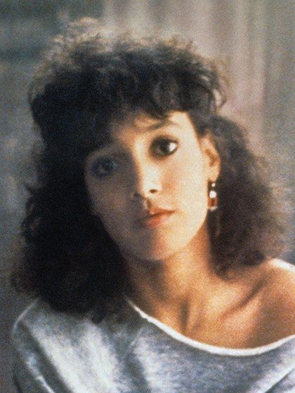 Those gorgeously fluffy curls. The headband. The off-the-shoulder sweatshirt. (OK, that has nothing to do with hair, but it really worked.) Who didn't want to be Jennifer Beals in the '80s? For Beals, the look came naturally. For the rest of us, there were perms and body waves. 13 Hairstyles, 80’s Hair, 80s Hairstyles, Fluffy Curls, 1980s Hair, Hair Clips 90s, Prom Hair Updo, Jennifer Beals, 80s Hair