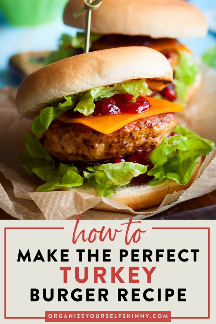 two turkey burgers with lettuce and cranberry sauce