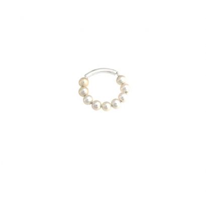 a white pearl beaded ring on a white background