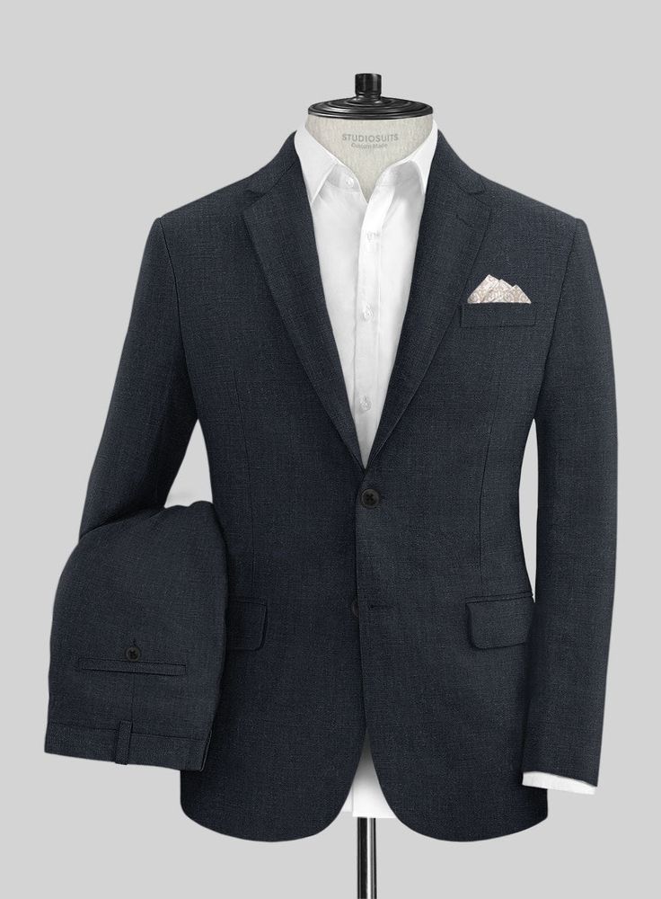 Classic luxury doesn't come any better than our well-tailored Dark Blue Linen Suit. Crafted from linen, the suit is the pinnacle of laid-back summer style as linen is breathable that keeps you all aired out. Keep it simple with a matching waistcoat, a crisp white shirt and dark brown brogue shoes.   Look Includes   Dark Blue Linen Fabric  Two Button Jacket Style  Notch Lapel  Horn Royal Black Buttons  Single Vent  Three Cuff Buttons  Two Welted Back Pockets on Trousers   You can change the look Fitted Linen Blazer With Pockets, Classic Linen Suit With Single Button, Fitted Linen Suit With Welt Pockets, Fitted Linen Suits With Welt Pockets, Linen Suit With Notch Lapel And Pockets, Linen Suits With Notch Lapel And Pockets, Linen Suits With Pressed Crease For Tailoring, Fitted Linen Blazer With Notch Lapel, Fitted Single Button Linen Blazer