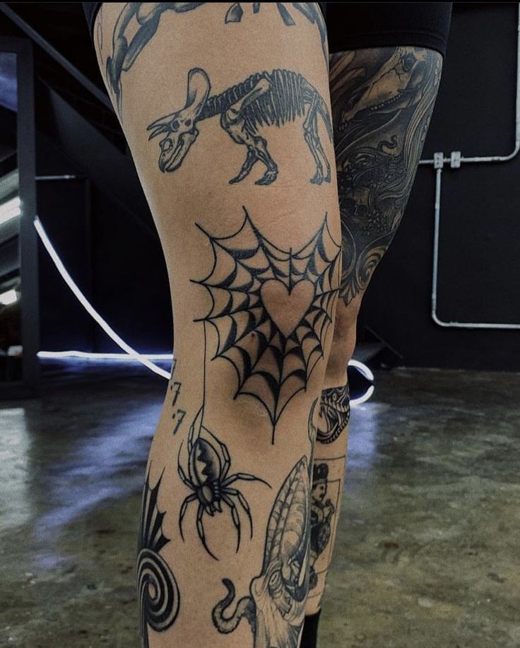 a person with tattoos on their legs