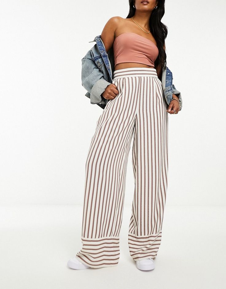 Printed Pants by River Island Make your jeans jealous High rise Stretch-back waistband Side pockets Wide leg Trendy Wide Leg Bottoms With Vertical Stripes, Chic High Waist Bottoms With Vertical Stripes, Spring Wide Leg Pants With Vertical Stripes, Chic Wide Leg Bottoms With Vertical Stripes, Chic High Waist Vertical Stripes Wide Leg Pants, Chic Striped High-waisted Wide Leg Pants, Chic High Waist Wide Leg Pants With Vertical Stripes, Trendy Striped Wide Leg Pants, Summer Wide Leg Pants With Contrast Stripes