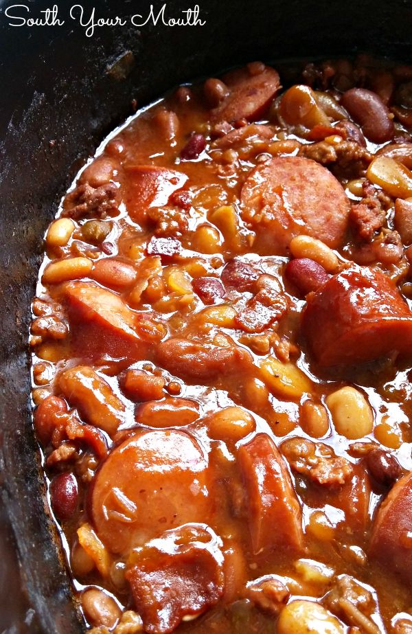 some beans and sausages are in a slow cooker