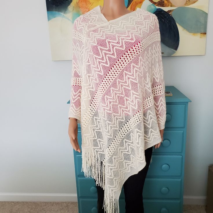 One Size. Knit Ivory Poncho From World Market Casual White Poncho For Fall, White Bohemian Long Sleeve Poncho, Beige Knit Poncho For Spring, Spring Beige Knit Poncho, Casual White Knit Poncho, White Oversized Casual Poncho, White Sweater For Winter Vacation, White Winter Sweater For Vacation, White Winter Vacation Sweater