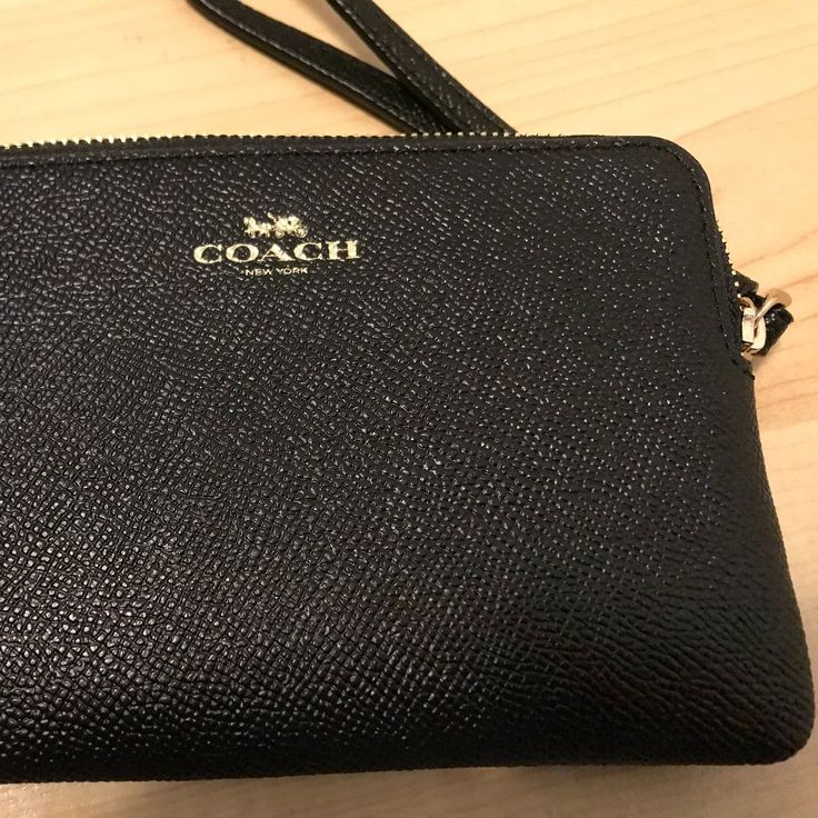 Coach Brand Wallet Clutch New With Tags Leather Coach Purse Wristlet Wallet Approx 6 3/8" X 4" X .5" Black Pebble Pattern On The Outside Black Fabric Inside 1 Main Compartments With 1 Tiny Side Compartments Coach Elegant Wallet With Cell Phone Pocket, Elegant Coach Wallet With Cell Phone Pocket, Coach Evening Clutch Wallet, Formal Clutch Wristlet With Zipper Closure, Coach Clutch Wallet, Elegant Coach Coin Purse With Zipper, Coach Formal Pouch Wallet, Coach Clutch Wallet With Removable Pouch, Classic Formal Wristlet With Zipper Closure