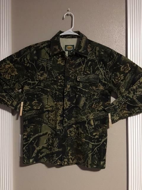 Excellent Used Condition - Like New! Youth Shirt Cabela's Size 14  (armpit-to-armpit measure is 20") Long Sleeve Button Down Button Front Pockets 35% Cotton, 45% Poly Military Style Long Sleeve Shirt With Buttons, Cotton Long Sleeve Camp Shirt With Button Closure, Military Style Shirt With Button Closure For Fall, Long Sleeve Cotton Camp Shirt With Buttons, Youth Shirt, Button Downs, Casual Button Down Shirt, Men Casual, Like New