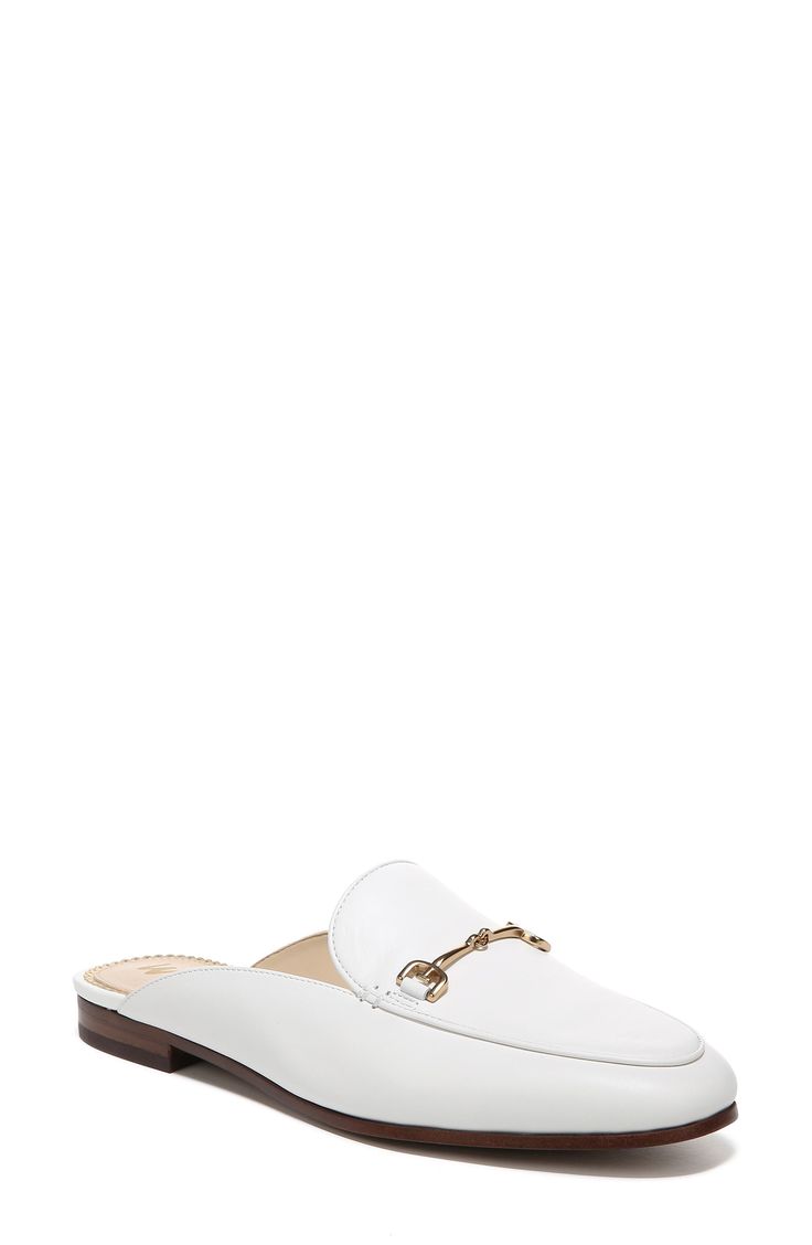 A glittery scalloped insole trim adds dainty style to this sleek mule that has brassy goldtone hardware and a subtle heel. Synthetic or leather upper and lining/rubber sole Imported White Loafers, Mcqueen Sneakers, Dainty Style, Miller Sandal, Top Sneakers Women, Strap Sandals Women, Sam Edelman Shoes, Ankle Strap Sandals, Womens Running Shoes