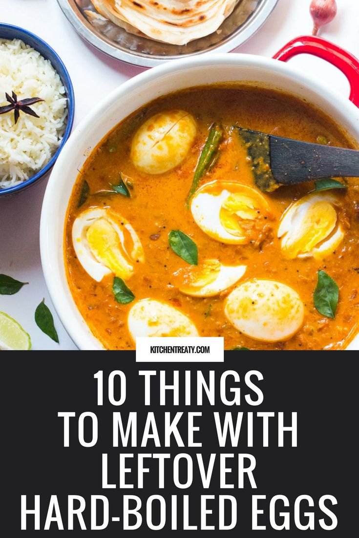 a bowl of soup with eggs in it and rice on the table next to it